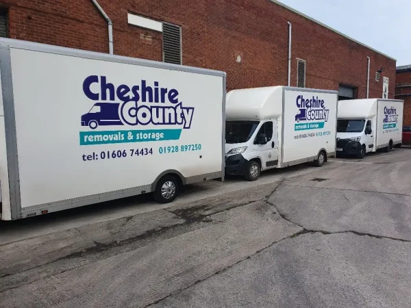 Cheshire County Removals and Storage branded vans parked outside the company depot